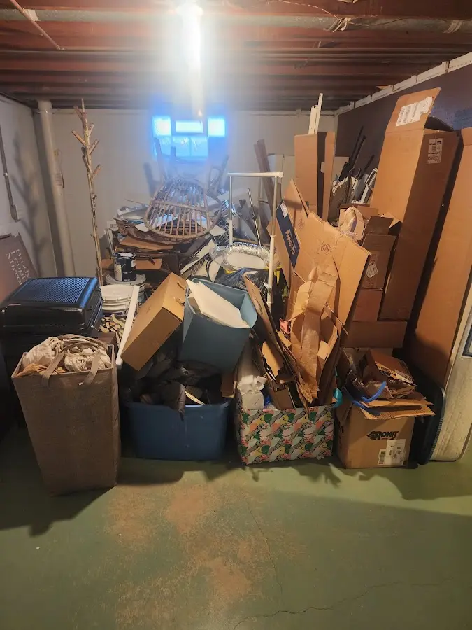 Roll-off dumpster container at job site for Roll Off Dumpster Rental in Monson